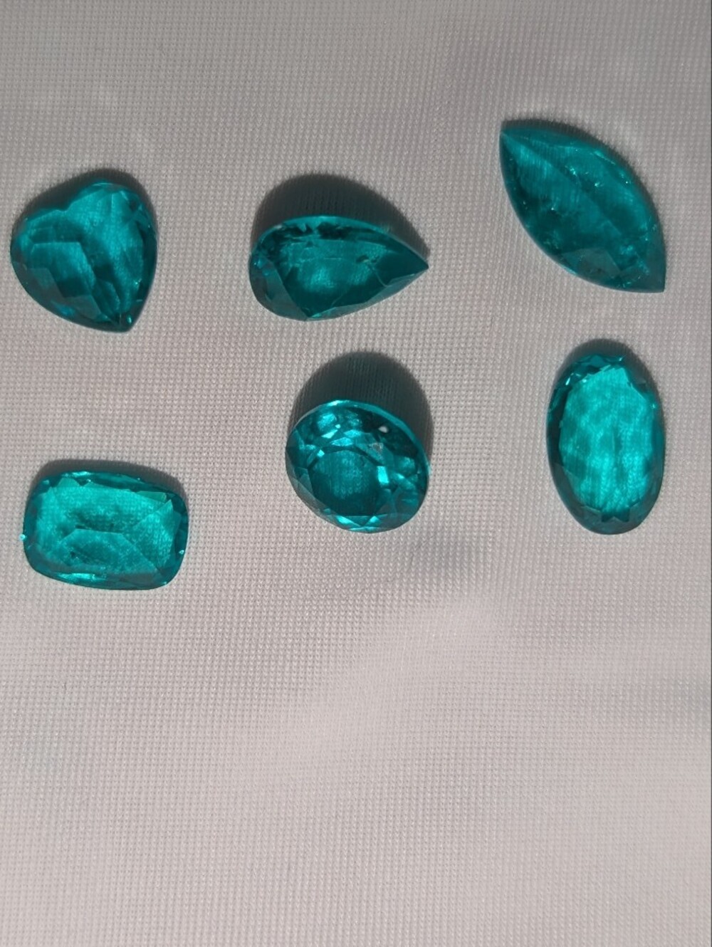 6 Lab Grown Emeralds, 13.57 Total Carat Weight